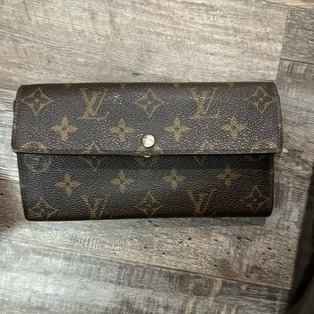 Well used Louis Vuitton monogram Sarah wallet